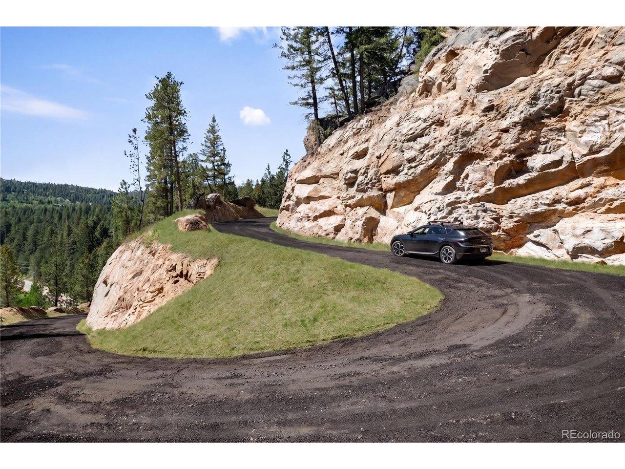 Image 2: This photo was enhanced to show width of driveway. Image 2: This photo was enhanced to show width of driveway.