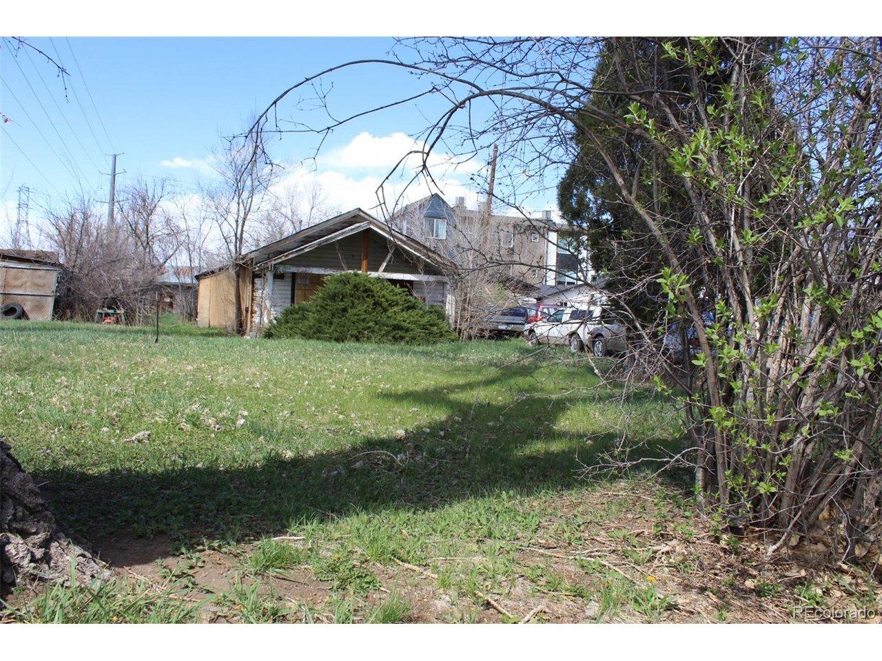 Image 2: Facing the front Southeast corner of the property. House is uninhabitable. Image 2: Facing the front Southeast corner of the property. House is uninhabitable.