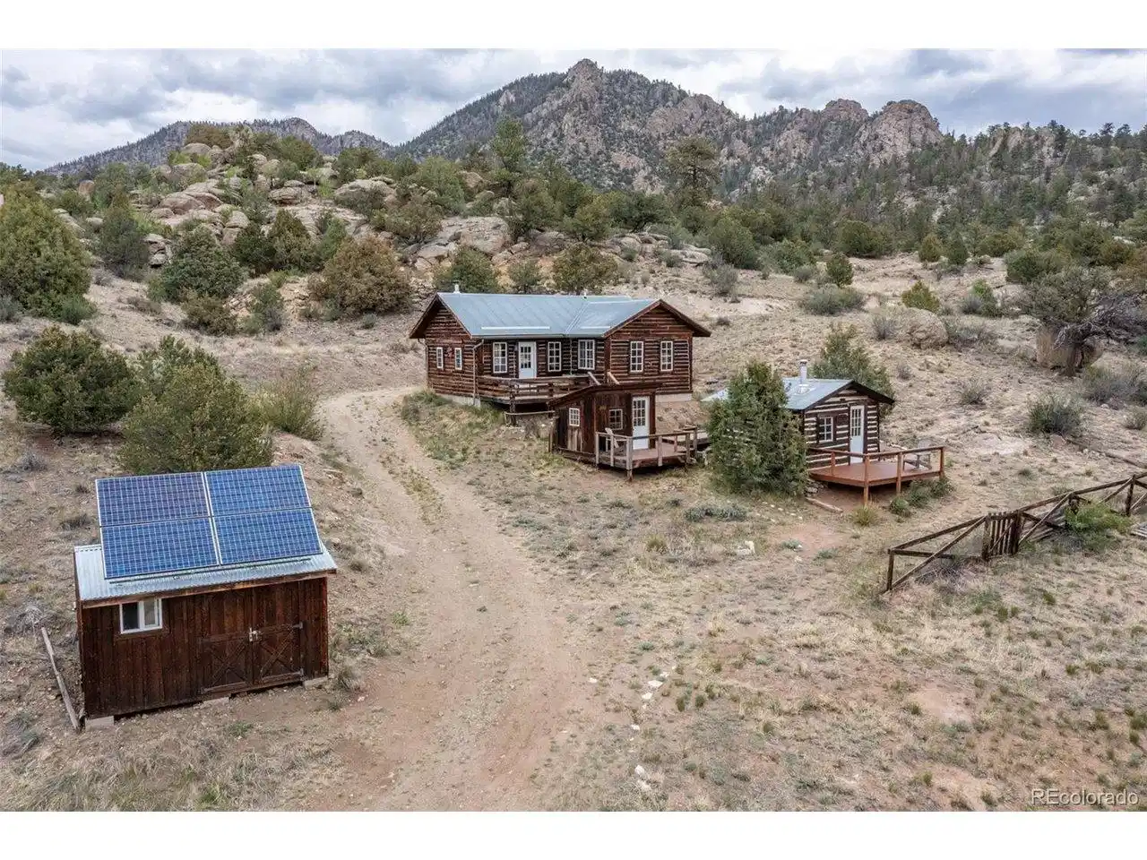 Image 1: 0.31 acres with 2 cabins, bunkhouse, solar shed Image 1: 0.31 acres with 2 cabins, bunkhouse, solar shed