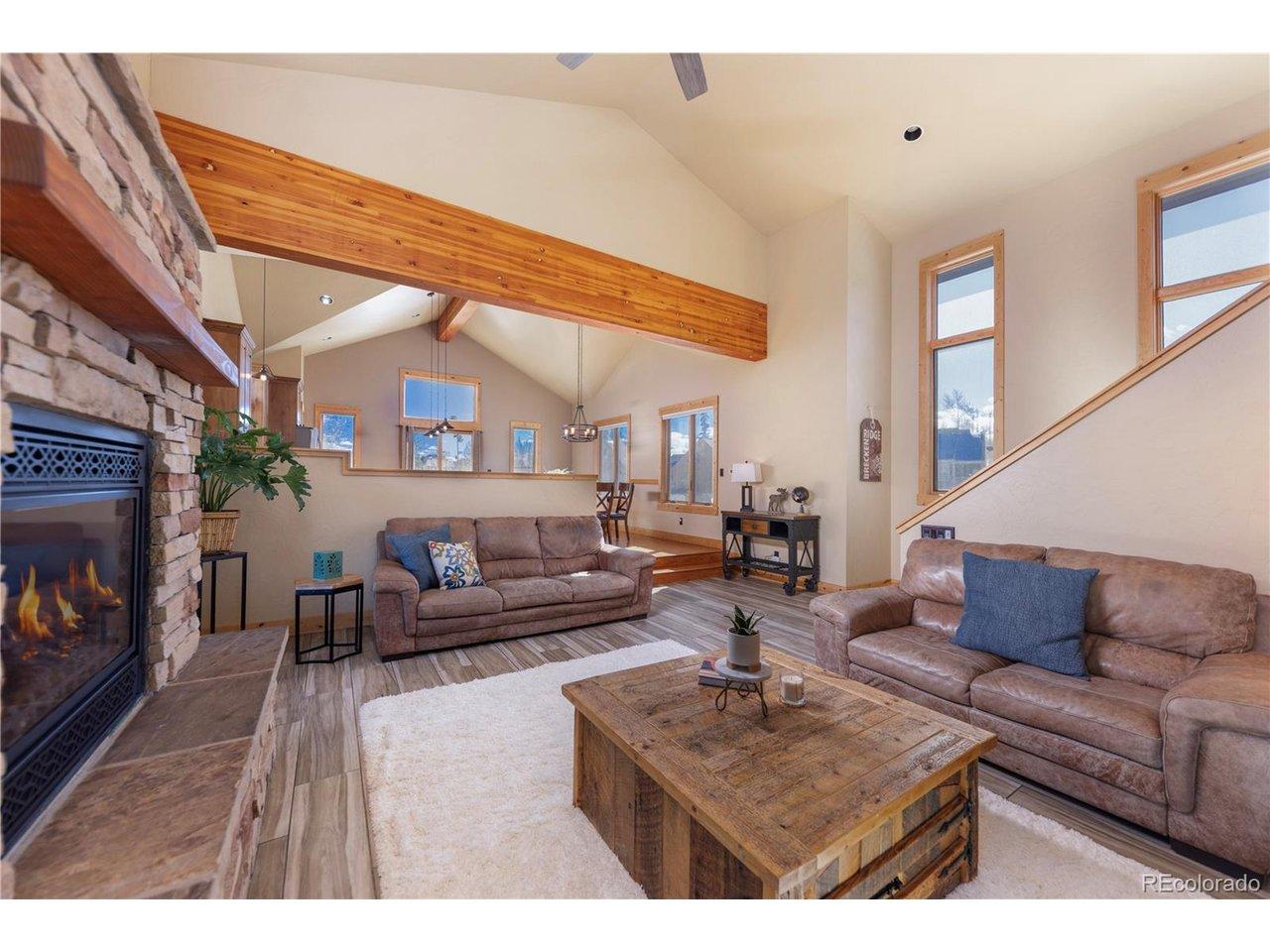 Image 3: Living Room with cathedral ceilings, beautiful beams
