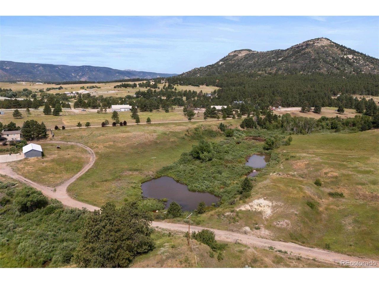 Image 2: Gentle canyons add character to the terrain, and a year-round pond and seasonal stream complete the landscape. Image 2: Gentle canyons add character to the terrain, and a year-round pond and seasonal stream complete the landscape.