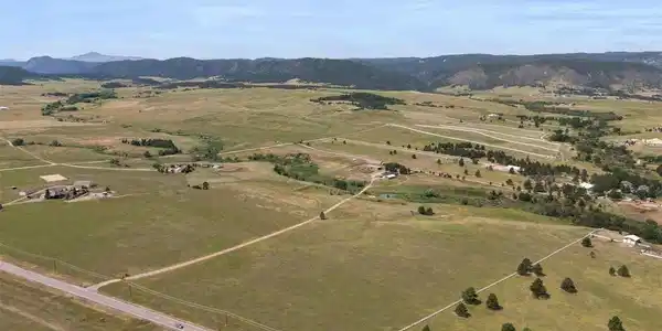 Image 3: Rolling, lush pastures are framed by mature Image 3: Rolling, lush pastures are framed by mature
