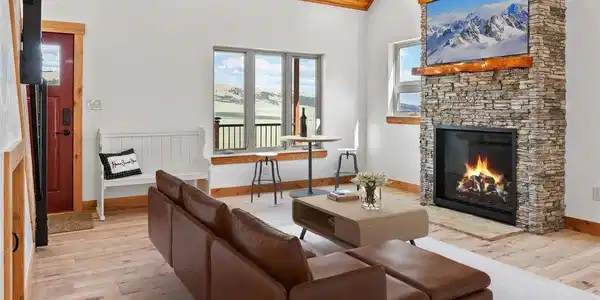 Image 4: Virtually staged Great Room with stone surround gas fireplace Image 4: Virtually staged Great Room with stone surround gas fireplace