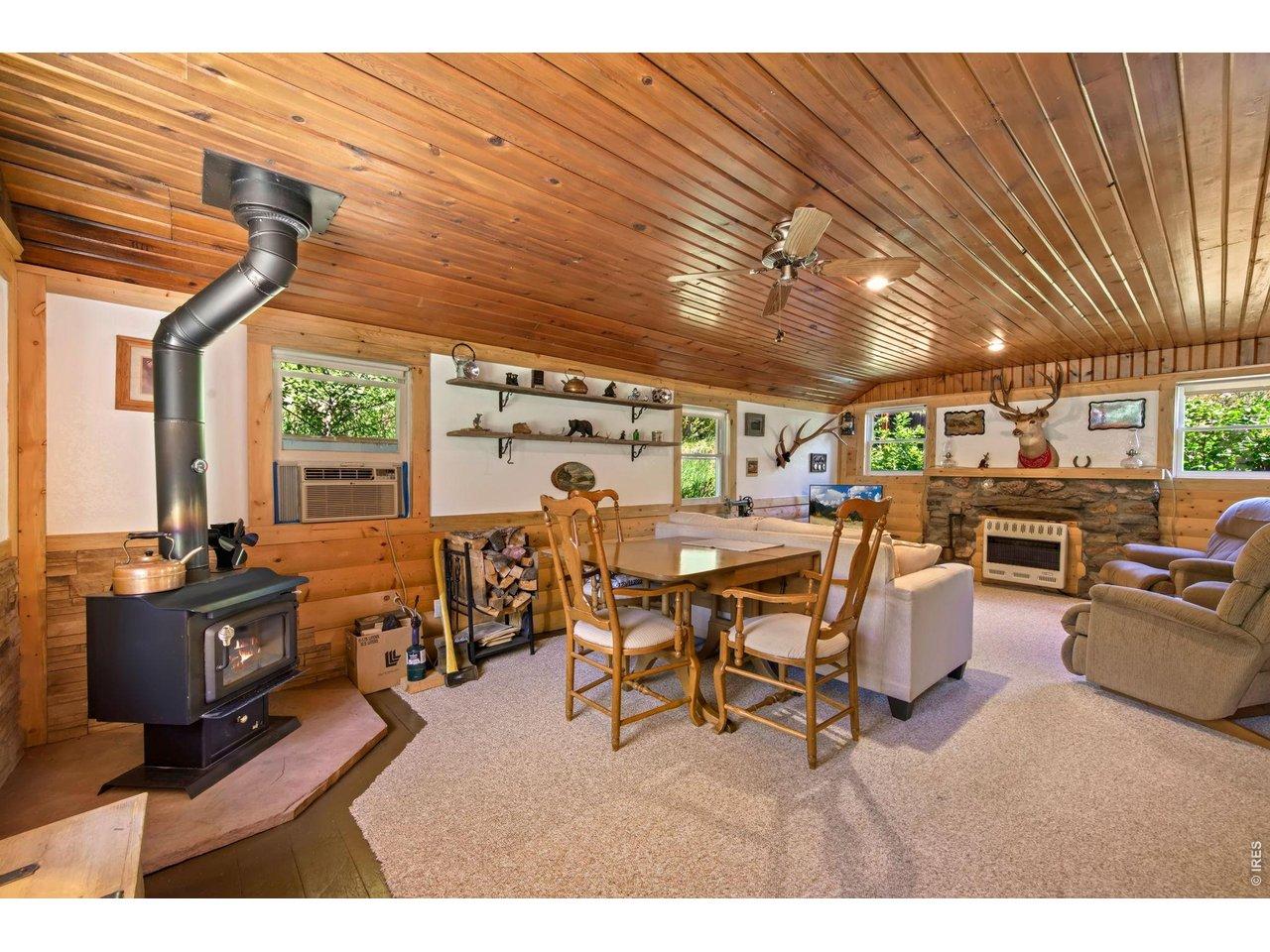 Image 3: Wood burning stove and wall air conditioner
