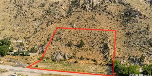 Image 3: Defined boundaries show a mix of level ground near the roadway and elevated terrain, offering multiple potential build sites with panoramic views. Image 3: Defined boundaries show a mix of level ground near the roadway and elevated terrain, offering multiple potential build sites with panoramic views.