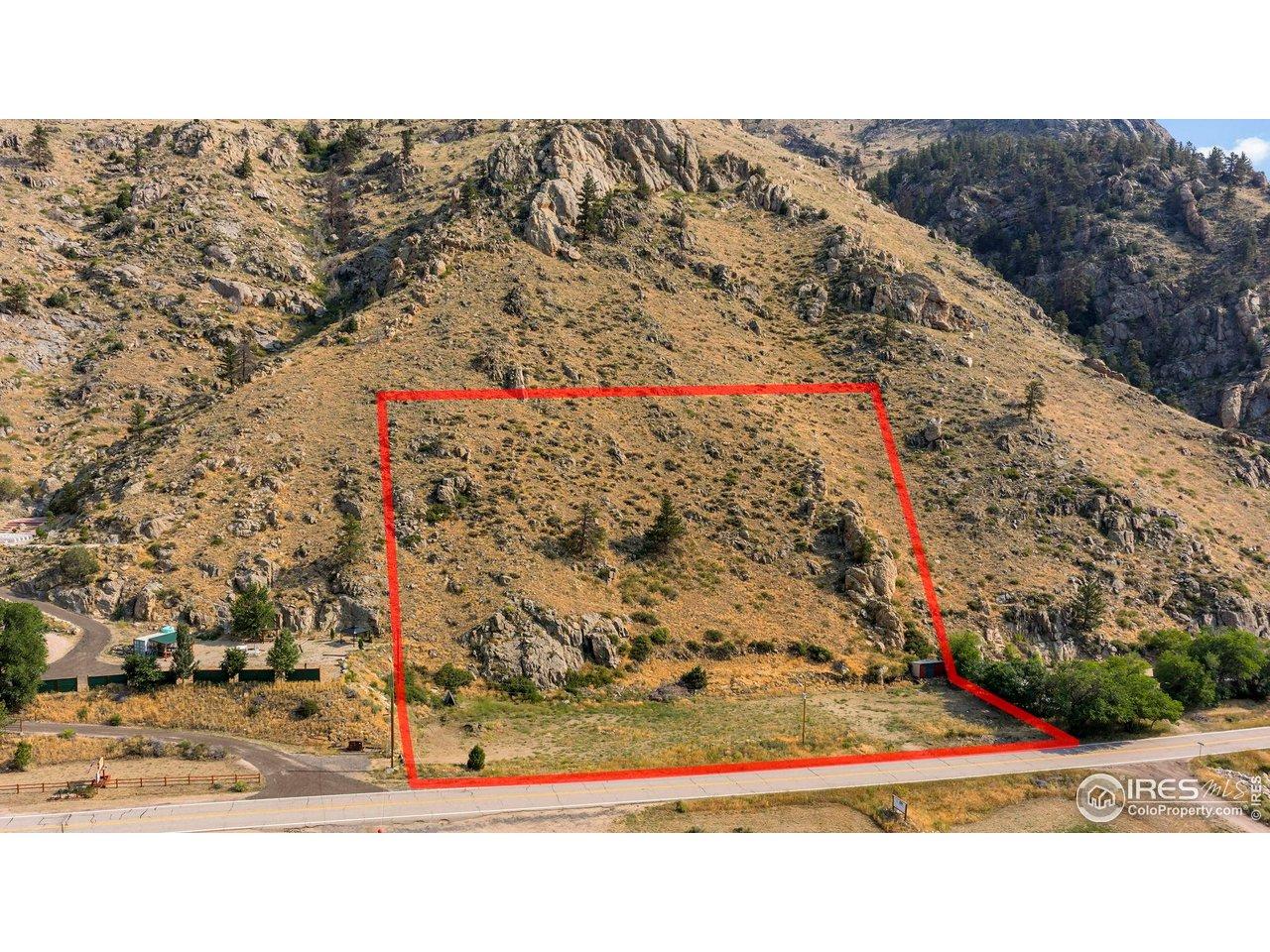 Image 4: Excellent visibility from the main road with easy access and a natural buffer of rock formations adding character to the property. Image 4: Excellent visibility from the main road with easy access and a natural buffer of rock formations adding character to the property.