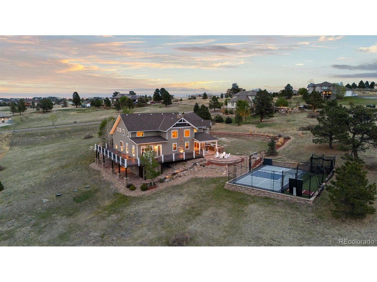Image 1: 11701 Dunrich Road is where timeless prestige meets elevated Colorado living-an extraordinary estate spanning over 8,600 sq. ft. on more than 2.5 private acres. Image 1: 11701 Dunrich Road is where timeless prestige meets elevated Colorado living-an extraordinary estate spanning over 8,600 sq. ft. on more than 2.5 private acres.