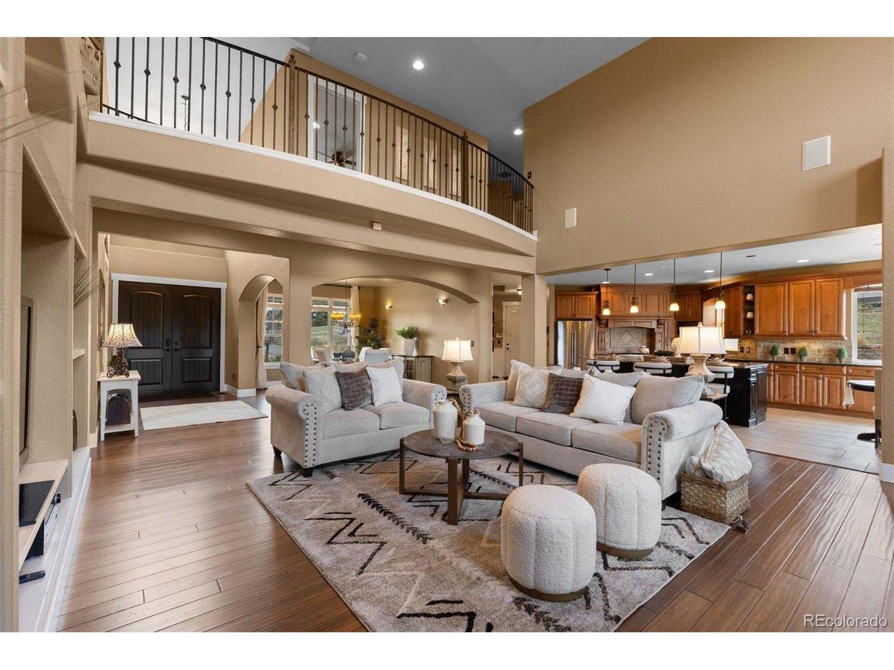 Image 2: Dramatic vaulted ceilings and expansive walls of glass fill the home with natural light, evoking an immediate sense of sophistication and scale. Image 2: Dramatic vaulted ceilings and expansive walls of glass fill the home with natural light, evoking an immediate sense of sophistication and scale.