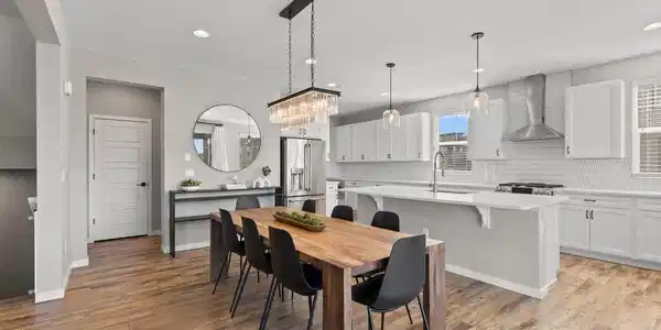 Image 4: Open dining room with designer lighting Image 4: Open dining room with designer lighting