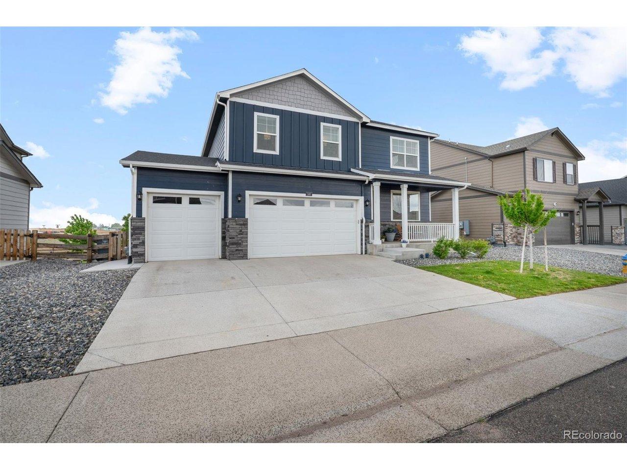 Image 2: You will love the 3 car garage and 3 spots to park in the driveway!