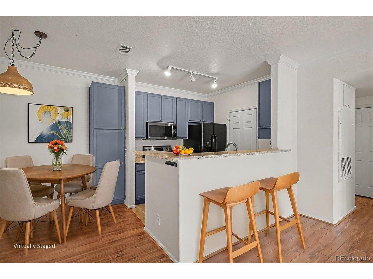 Image 2: Dining room, kitchen, and eat-in peninsula Image 2: Dining room, kitchen, and eat-in peninsula