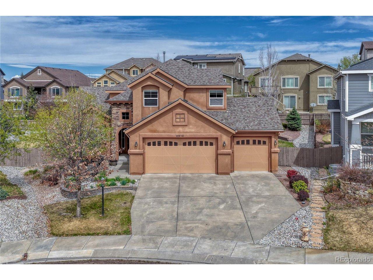 Image 1: Tucked away on a tranquil cul-de-sac in the desirable Cordera Community, this beautiful stucco home offers effortless daily living with an attached three-car garage to house all your vehicles and outdoor gear