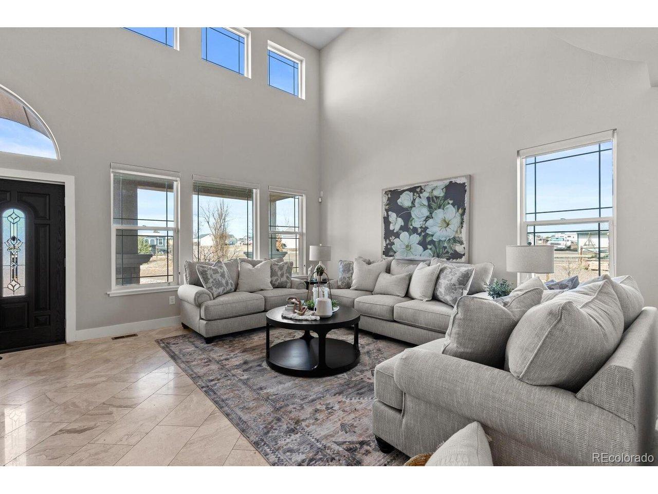 Image 4: Spacious living room with high ceilings Image 4: Spacious living room with high ceilings