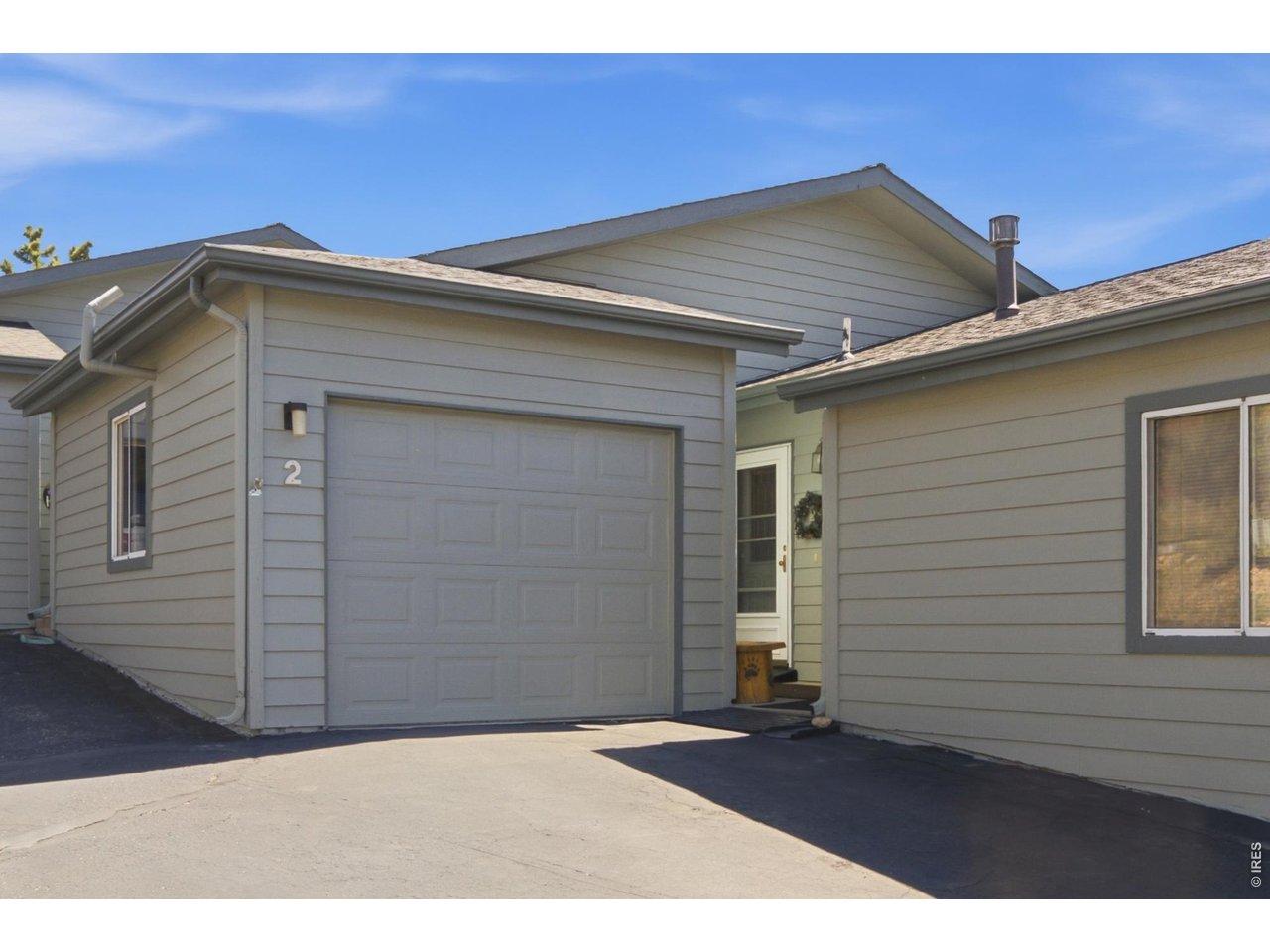 Image 2: Front of Condo with 1-car Garage Image 2: Front of Condo with 1-car Garage