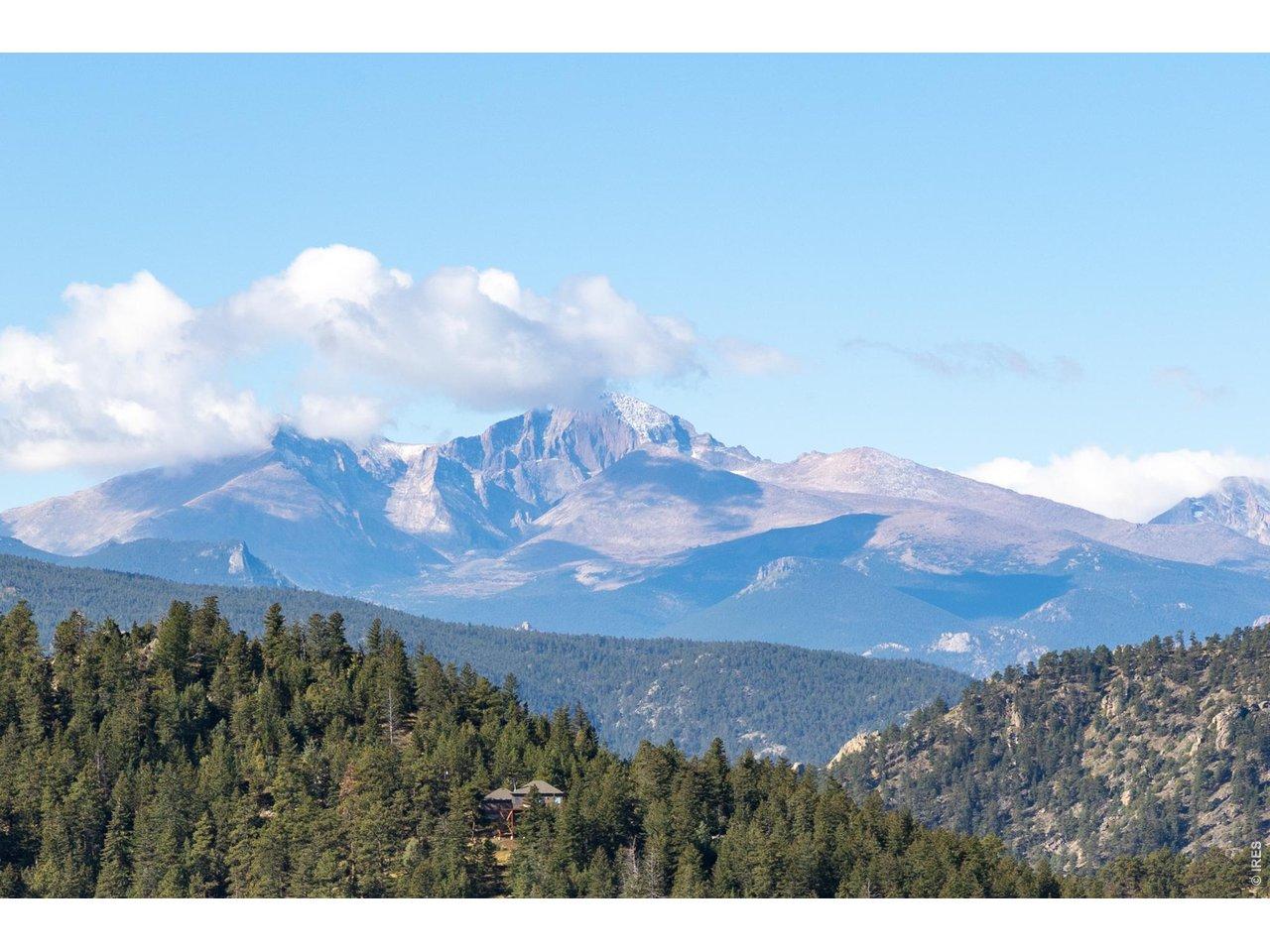 Image 1: Beautiful and improved lot with views of Long's Peak. This slice of heaven is less than 20 minutes from Estes and less than 30 minutes from Loveland. Image 1: Beautiful and improved lot with views of Long's Peak. This slice of heaven is less than 20 minutes from Estes and less than 30 minutes from Loveland.