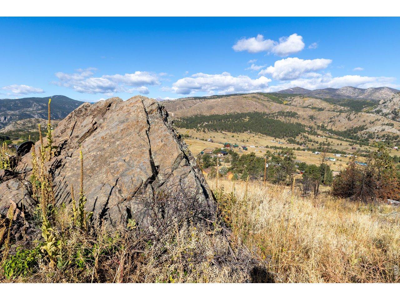 Image 2: Beautiful rock outcroppings and more that 180 degree views provide for a perfect lot to do your own custom build. Image 2: Beautiful rock outcroppings and more that 180 degree views provide for a perfect lot to do your own custom build.