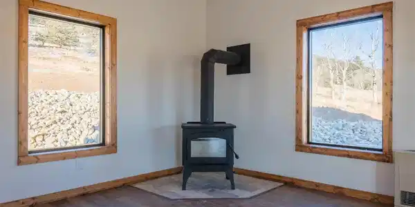 Image 3: Main living area with optional wood burning stove Image 3: Main living area with optional wood burning stove