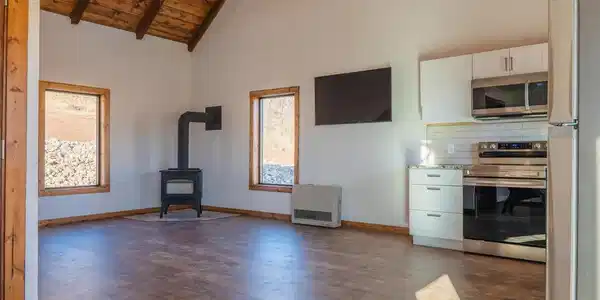 Image 4: Main living area with optional wood burning stove Image 4: Main living area with optional wood burning stove