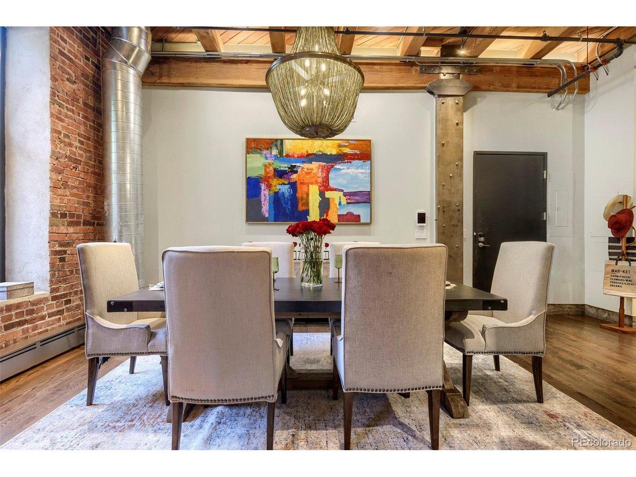 Image 2: Grand dining room with custom chandelier, entertaining space, and a versatile area ideal for a grand piano, art studio, or home office. Image 2: Grand dining room with custom chandelier, entertaining space, and a versatile area ideal for a grand piano, art studio, or home office.