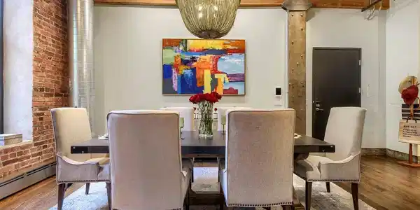 Image 2: Grand dining room with custom chandelier, entertaining space, and a versatile area ideal for a grand piano, art studio, or home office. Image 2: Grand dining room with custom chandelier, entertaining space, and a versatile area ideal for a grand piano, art studio, or home office.