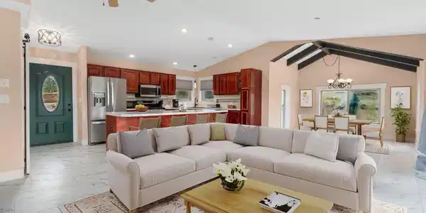 Image 4: Great room opens to kitchen & dining nook (virtually staged). Main floor is completely refreshed. Image 4: Great room opens to kitchen & dining nook (virtually staged). Main floor is completely refreshed.