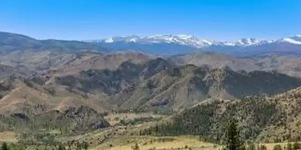 Image 2: Unparalleled Views of the Snow-Capped Mummy Range