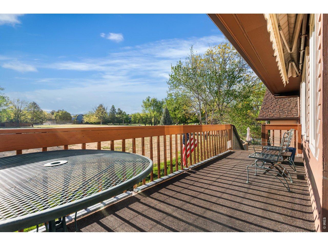 Image 4: Low maintenance decking with retractable shades.