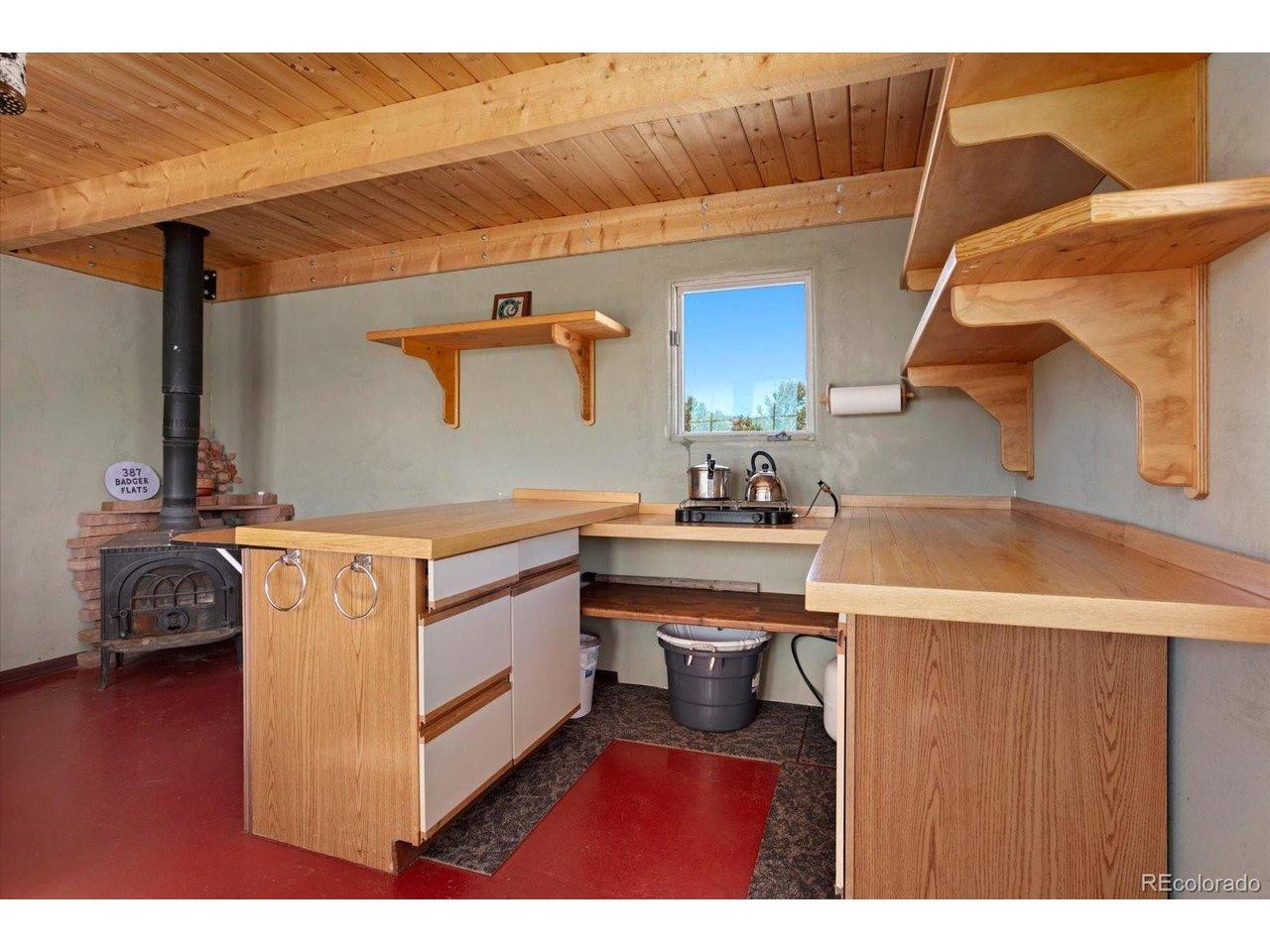 Image 4: Kitchen with storage and propane Image 4: Kitchen with storage and propane