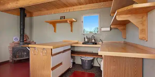 Image 4: Kitchen with storage and propane Image 4: Kitchen with storage and propane