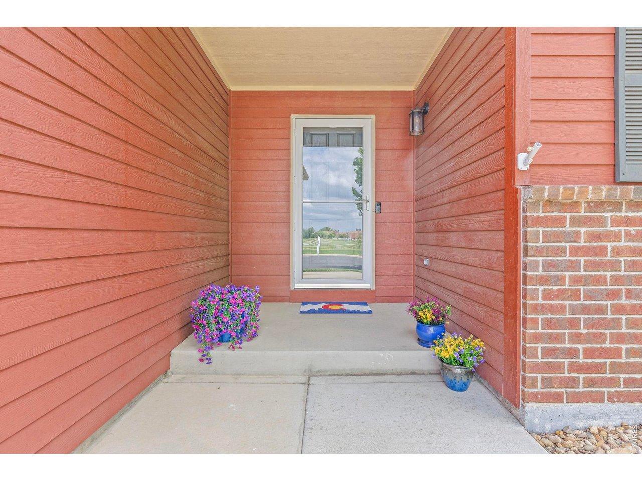 Image 4: West facing covered front porch perfect for taking in the sunset and enjoying morning coffee Image 4: West facing covered front porch perfect for taking in the sunset and enjoying morning coffee