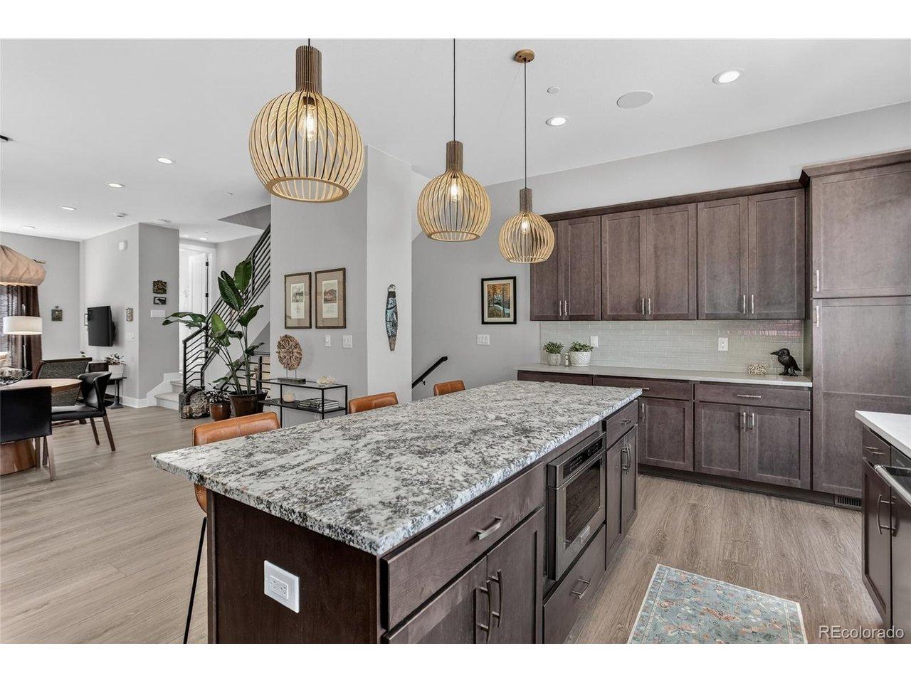 Image 2: Upgraded island & custom light fixtures Image 2: Upgraded island & custom light fixtures