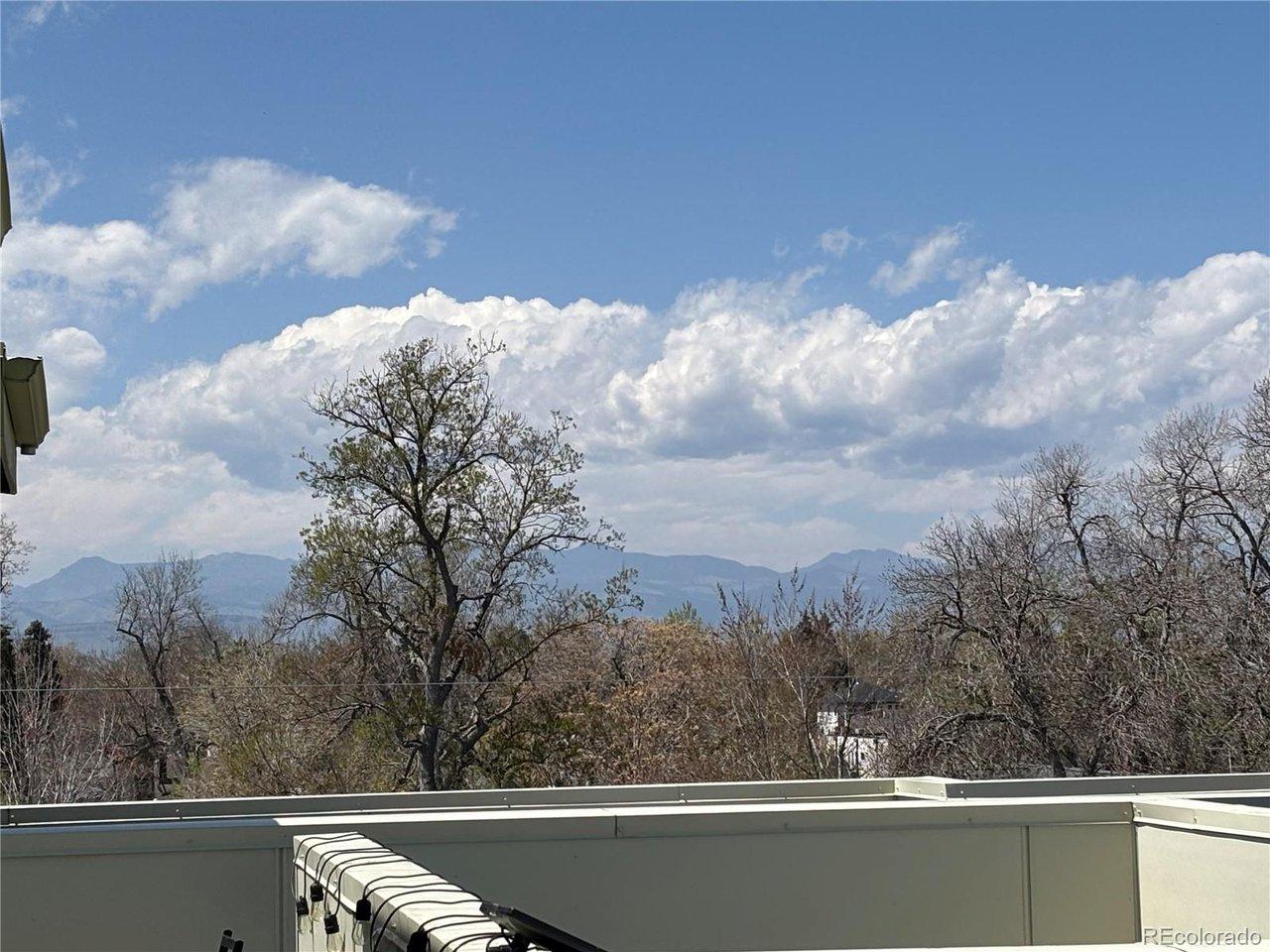 Image 4: Mountain Views from the rooftop patio/garden/deck! Image 4: Mountain Views from the rooftop patio/garden/deck!