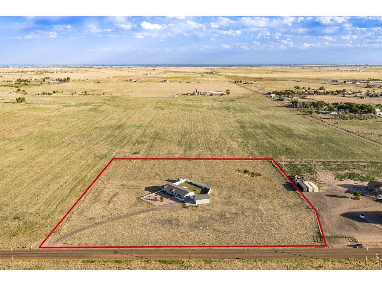 Image 2: Experience the freedom of rural Northern Colorado on 5 fenced acres with incredible Rocky Mountain views, Ag zoning, NO HOA, and NO Metro Tax. Image 2: Experience the freedom of rural Northern Colorado on 5 fenced acres with incredible Rocky Mountain views, Ag zoning, NO HOA, and NO Metro Tax.