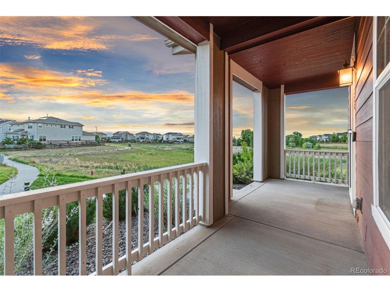 Image 2: Relax on the oversized covered front porch while taking in peaceful sunsets and neighborhood views. Image 2: Relax on the oversized covered front porch while taking in peaceful sunsets and neighborhood views.