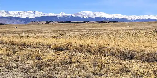 Image 3: Zoomed northwest from the property to snow capped mountain peaks Image 3: Zoomed northwest from the property to snow capped mountain peaks