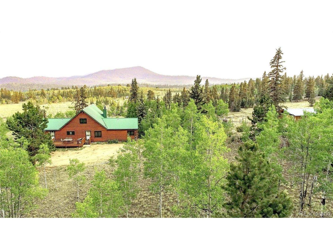 Image 3: Main-Level Living Floorplan with Walk-out Basement, 2-Car Attached Garage and scenic 38+ acre site