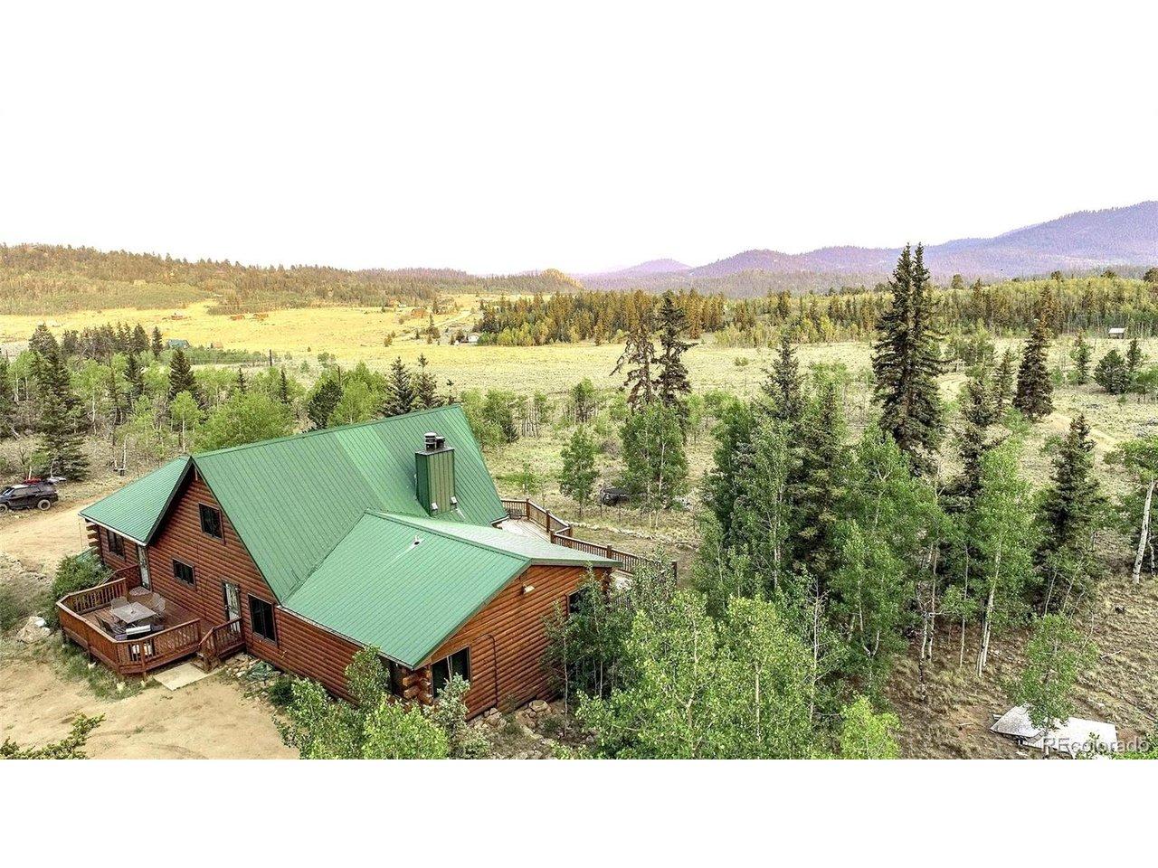 Image 4: Main-Level Living Floorplan with Walk-out Basement, 2-Car Attached Garage and scenic 38+ acre site