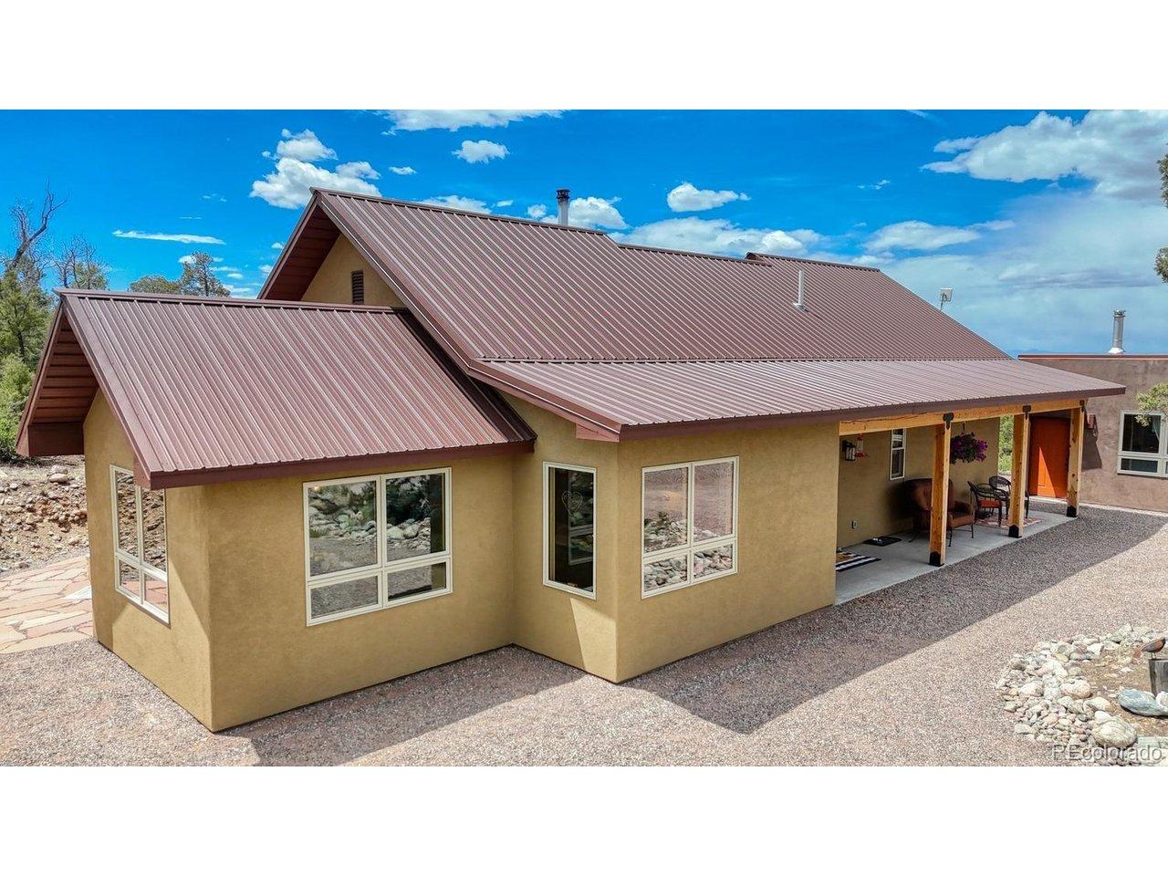 Image 1: Custom designed home, ADU and 2 car  garage located on 3+ acres