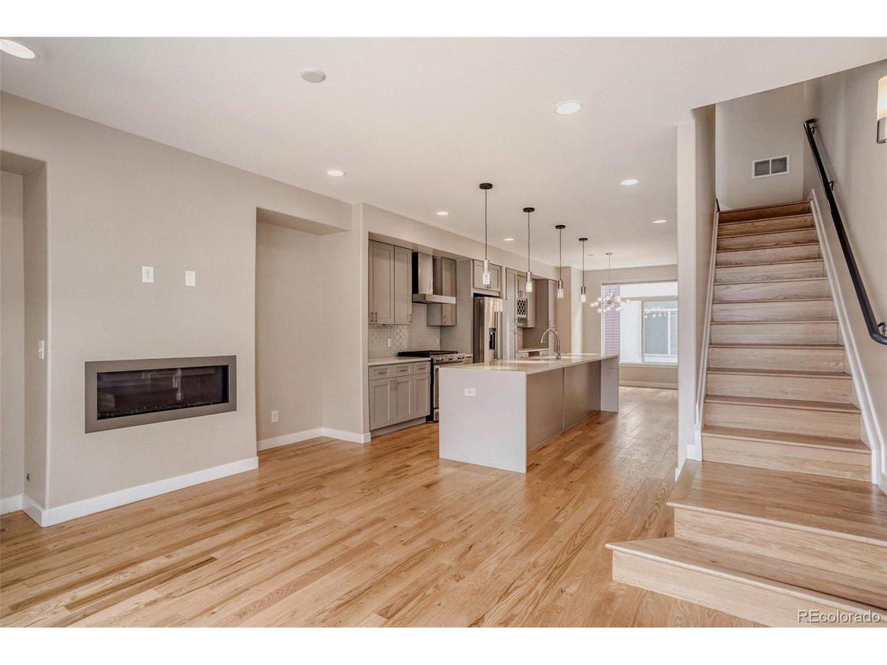 Image 2: Open living space with tons of natural light, gas fireplace & more Image 2: Open living space with tons of natural light, gas fireplace & more