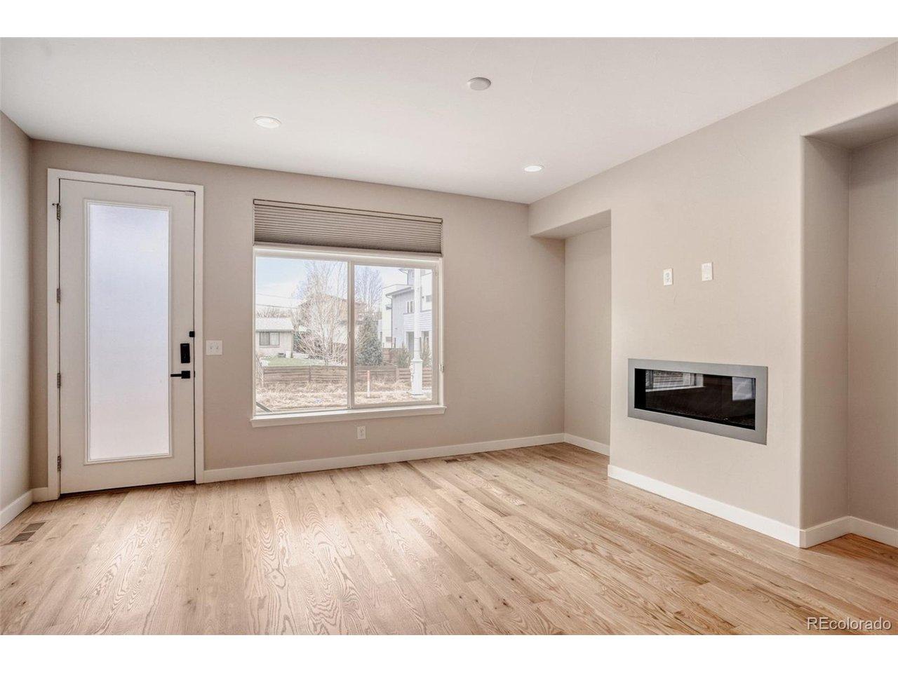 Image 3: Open living space with tons of natural light, gas fireplace & more Image 3: Open living space with tons of natural light, gas fireplace & more