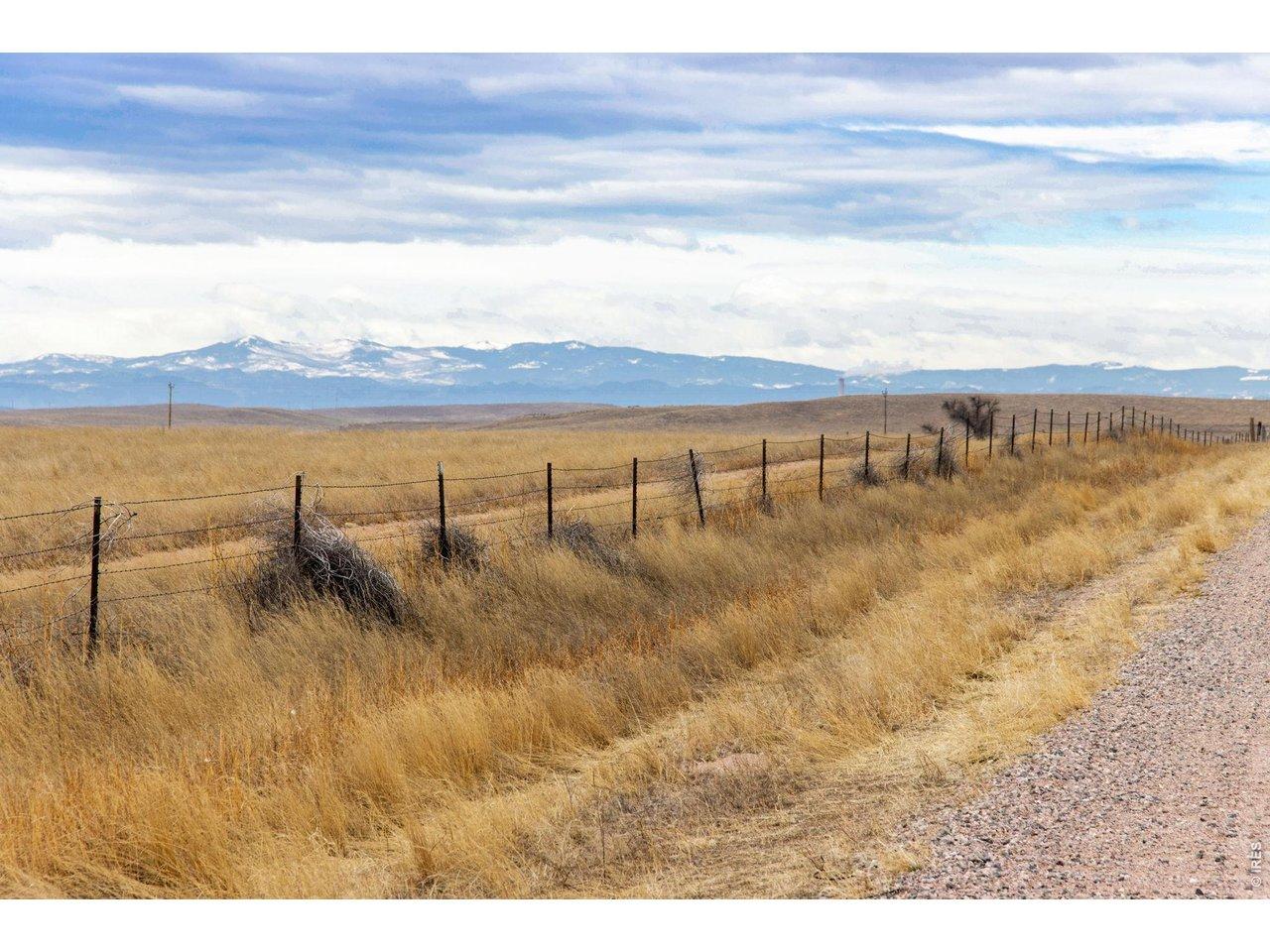 Image 1: Unwind in the serenity of wide-open skies and rolling terrain. Build your dream home here in Carr
