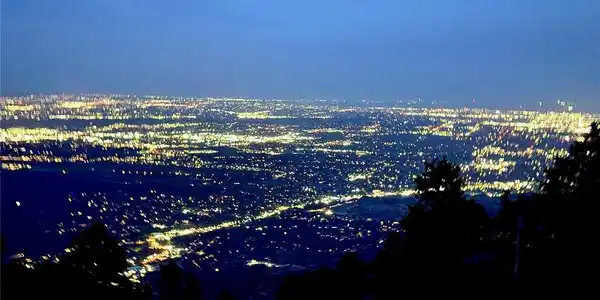 Image 2: View of the city lights at night from the lot Image 2: View of the city lights at night from the lot