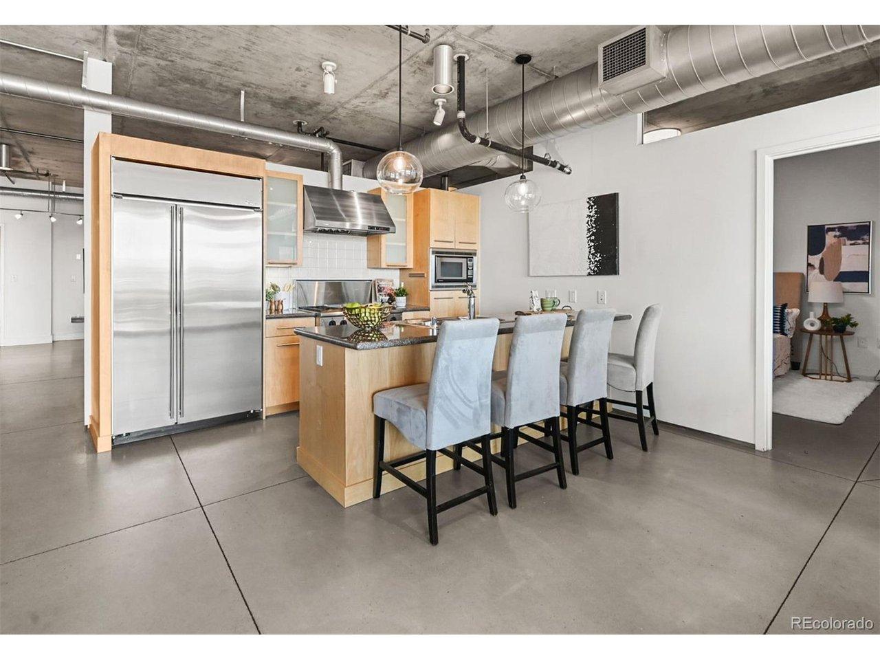 Image 2: The heart of the home-overlooking the entire open floor plan - never miss a moment of the conversation Image 2: The heart of the home-overlooking the entire open floor plan - never miss a moment of the conversation