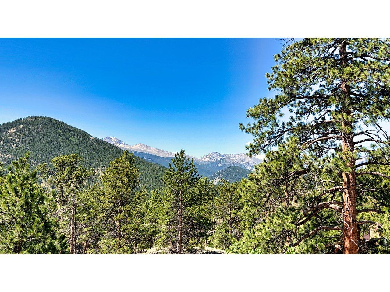 Image 1: Build your mountain getaway on this beautiful 1.26-acre lot in Estes Park.