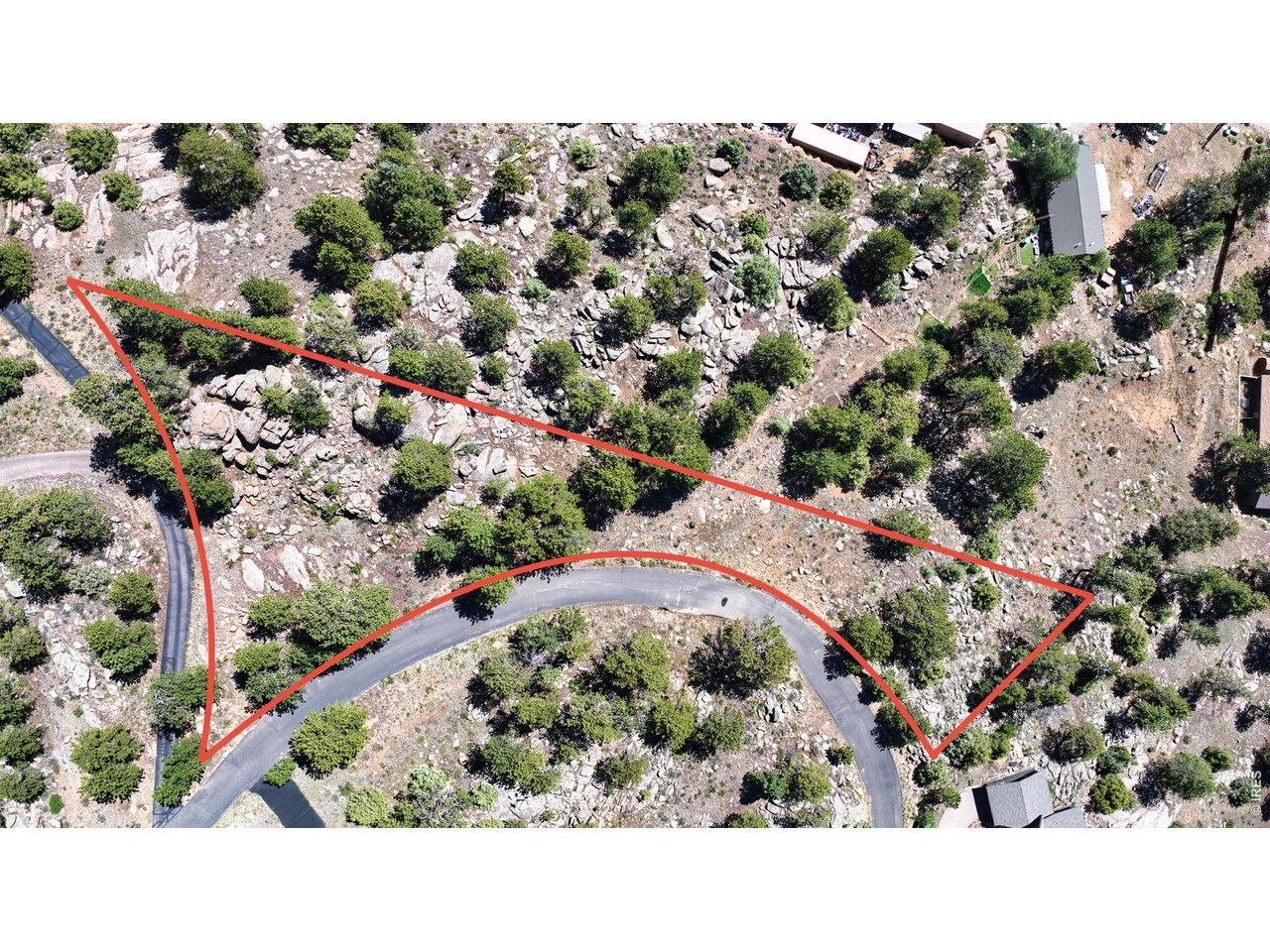 Image 3: 1.26-acre lot with paved street access.