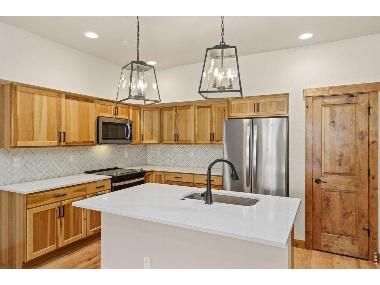 Image 4: Quartz countertops throughout Image 4: Quartz countertops throughout