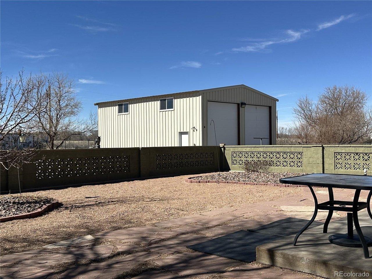 Image 2: The extended back yard is gated & fenced. Image 2: The extended back yard is gated & fenced.