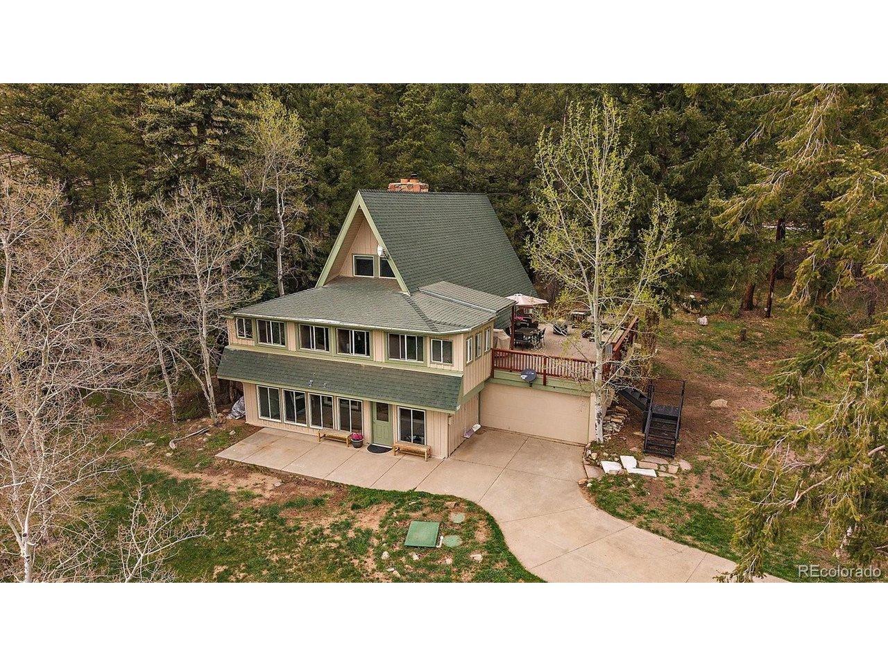 Image 2: Front of House with Patio