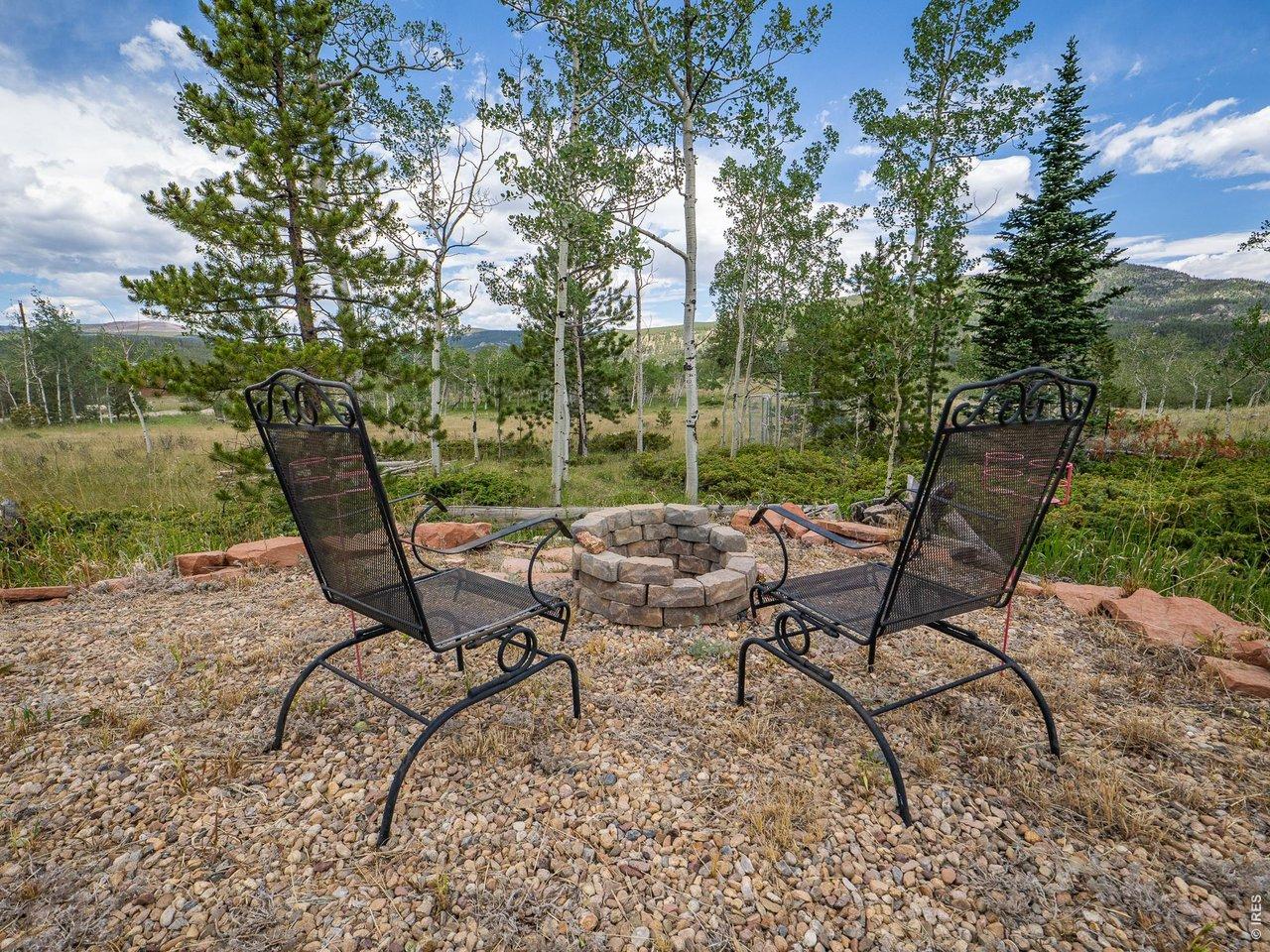 Image 2: Gather round the firepit and enjoy the views from your own camp site.
