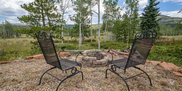 Image 2: Gather round the firepit and enjoy the views from your own camp site. Image 2: Gather round the firepit and enjoy the views from your own camp site.